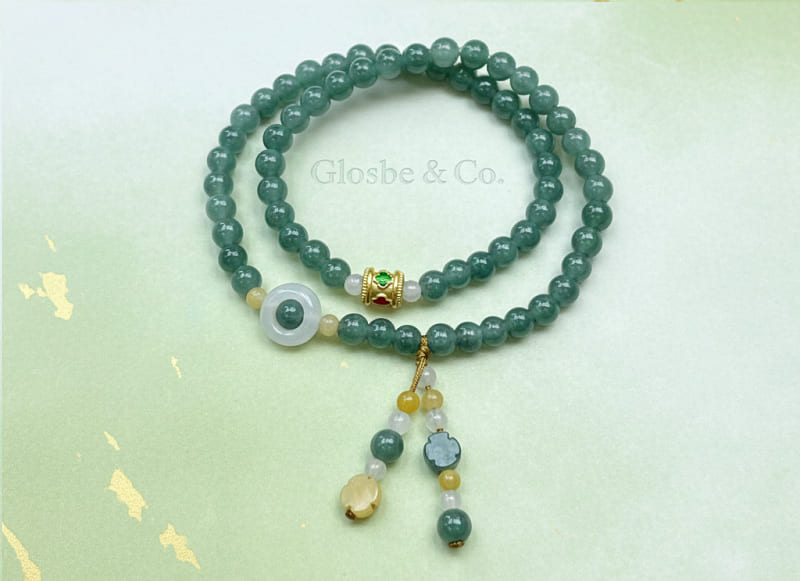 Trang sức phong thủy Mệnh Hỏa 2026 vòng phỉ thúy phối charm vàng 18K hiện đại