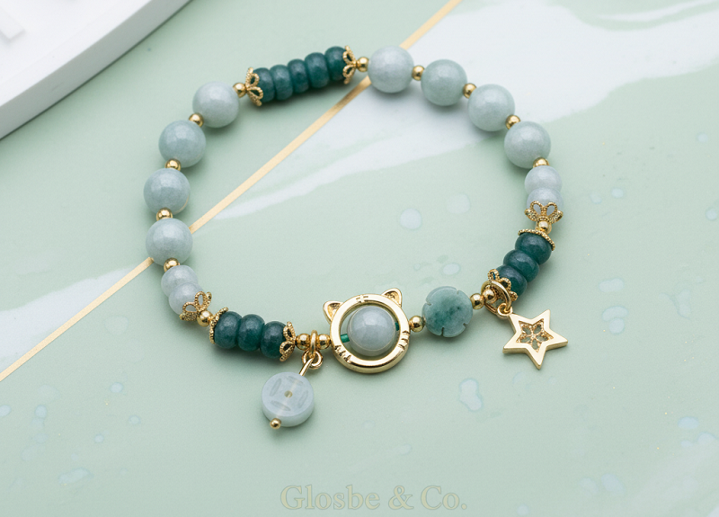 Cách chọn màu đá quý hợp mệnh Thủy phối cùng charm bạc 925 tinh tế.